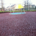 Recycled Rubberised Mulch Park in Throcking 3